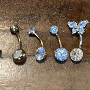 Assortment of belly button rings 14g 6 of them